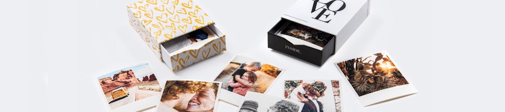 Photo boxes with designs with hearts and the word "LOVE", including various pictures
