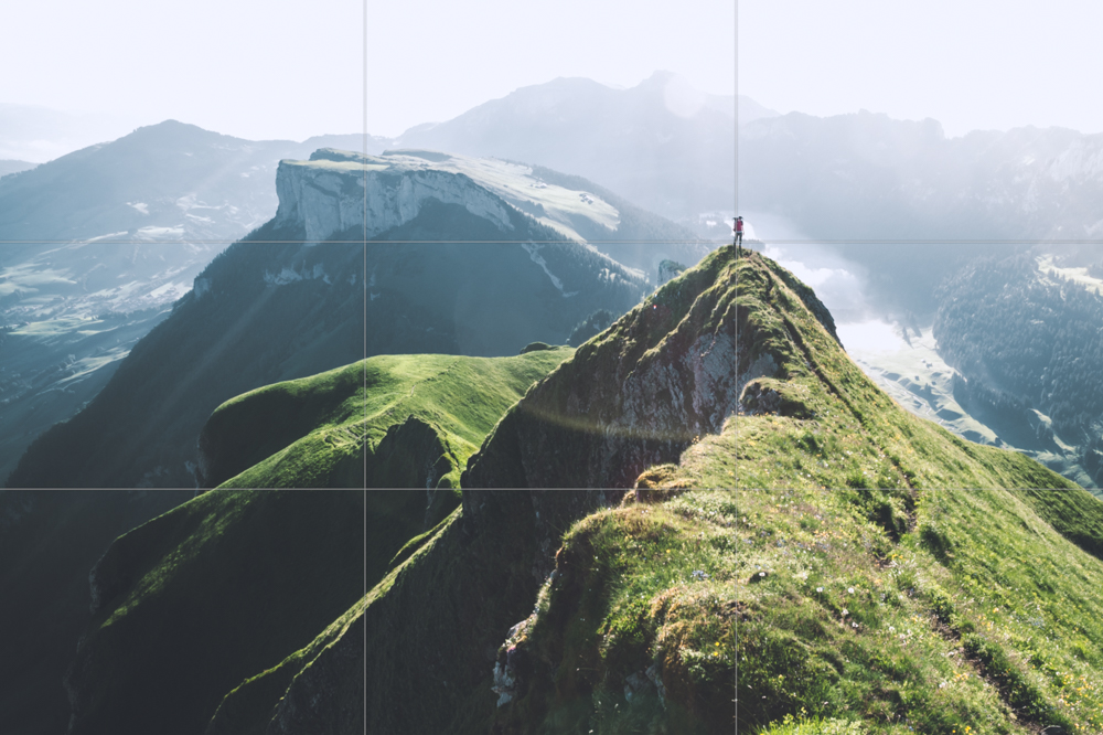 Landscape photography of green mountains with orientation lines according to the golden ratio