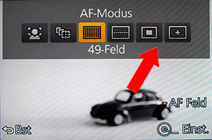 AF control on a camera display, focussing on a toy car