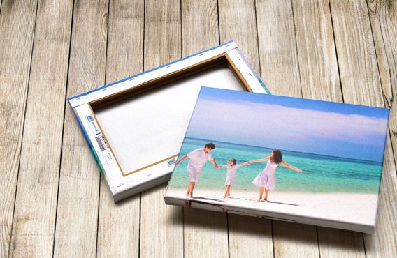 Canvas print showing parents with their son, hand in hand at a beautiful beach