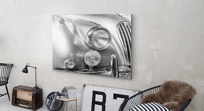 Alu Dibon Brushed Print in black and white in a modern living room, showing the headlights of an oldtimer