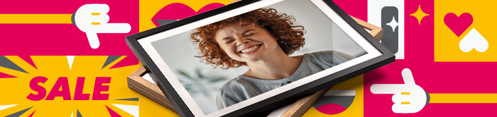 Sale Teaser: Wall art with photo of a smiling woman in a black frame